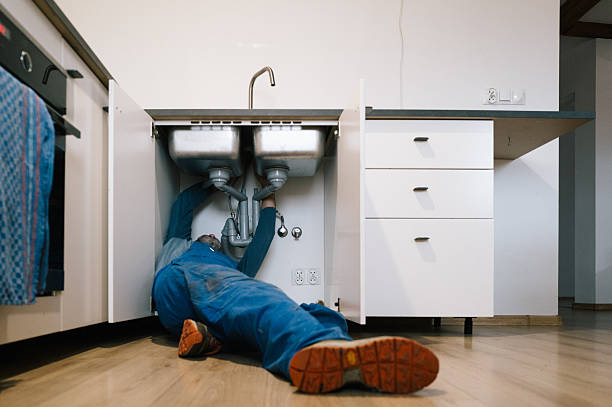 Professional Drain Cleaning technician working in Coalville, UT